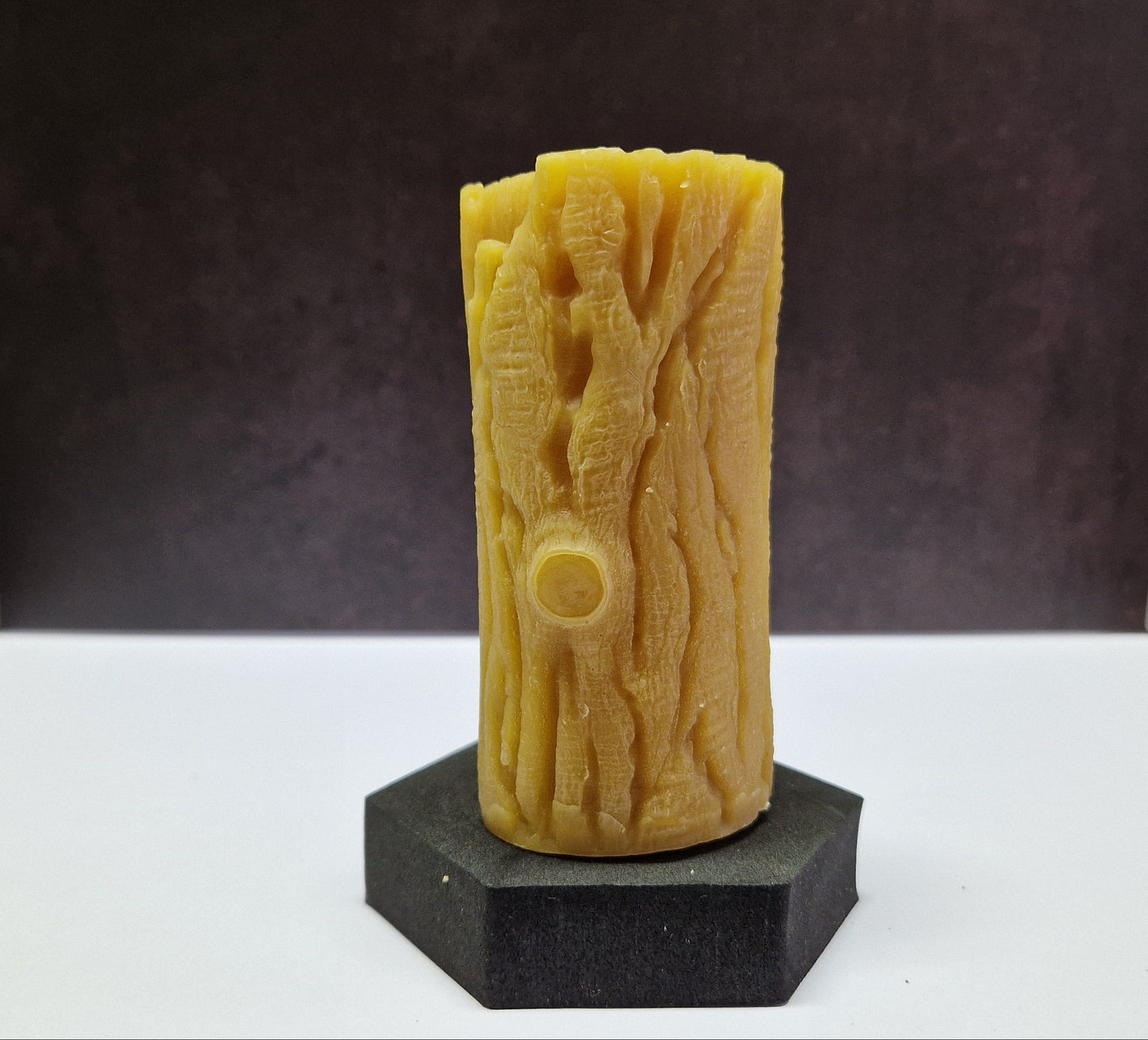 Kerze Baumstamm Motiv