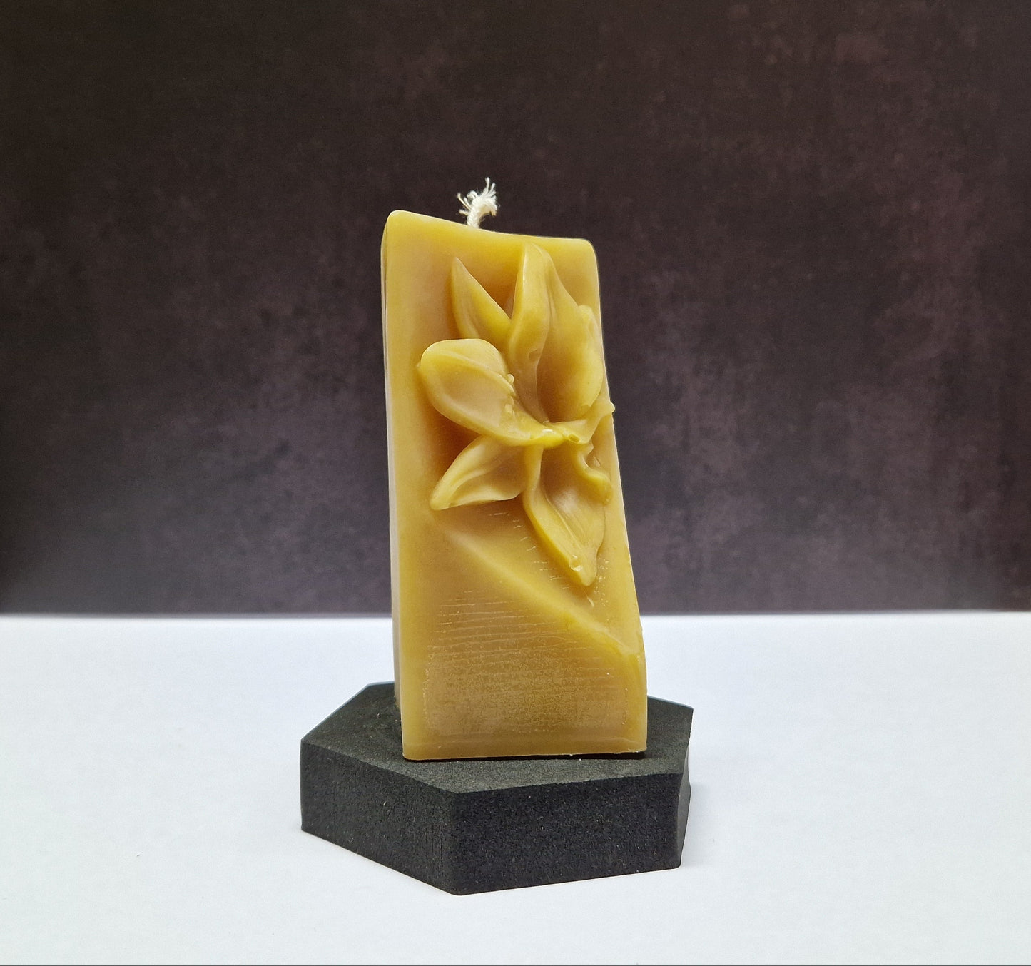 Kerze Lilienblüte Motiv