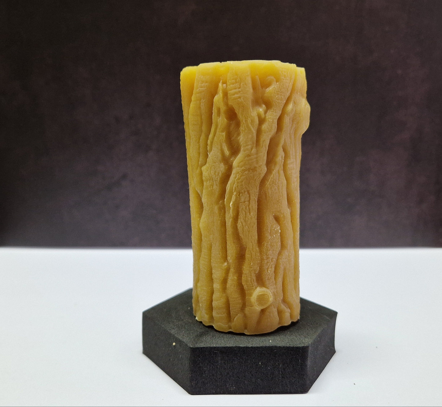 Kerze Baumstamm Motiv