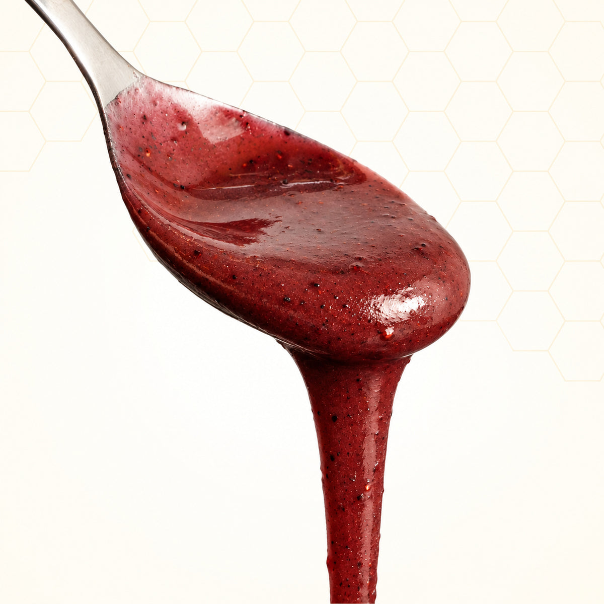 Brombeere mit Honig - fruchtig & säuerlich | 250g – Konsistenz auf einem Silberlöffel
